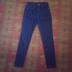 High waisted stretchy jeans. Size: 26